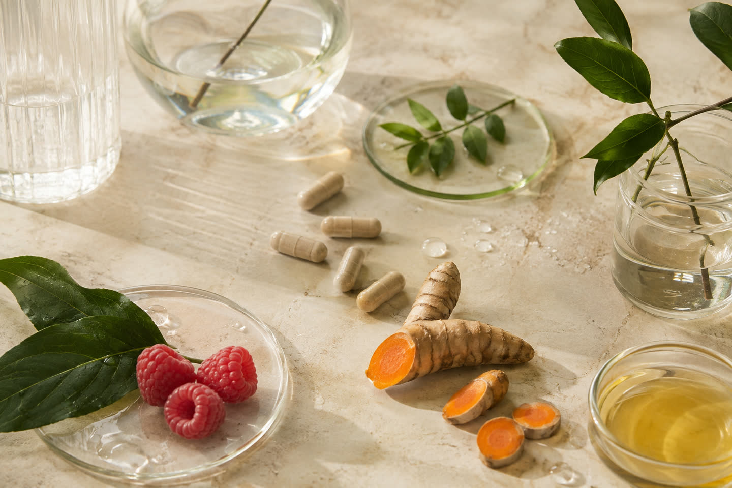 Botanical ingredients and glass vessels expressing ingredient science
